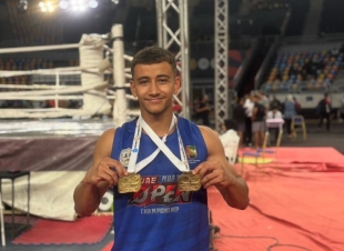 طالب بالجامعة الأمريكية يُتوج بجائزة المركز الأول في بطولة كأس أفريقيا لـ«الكيك بوكسينج»