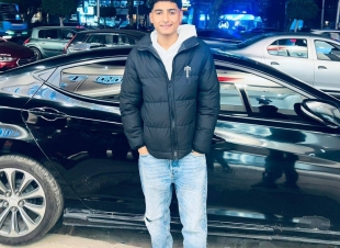 علاء السعودي يهنئ الطالب حازم محمد سيد لتفوقه في الثانوية العامة